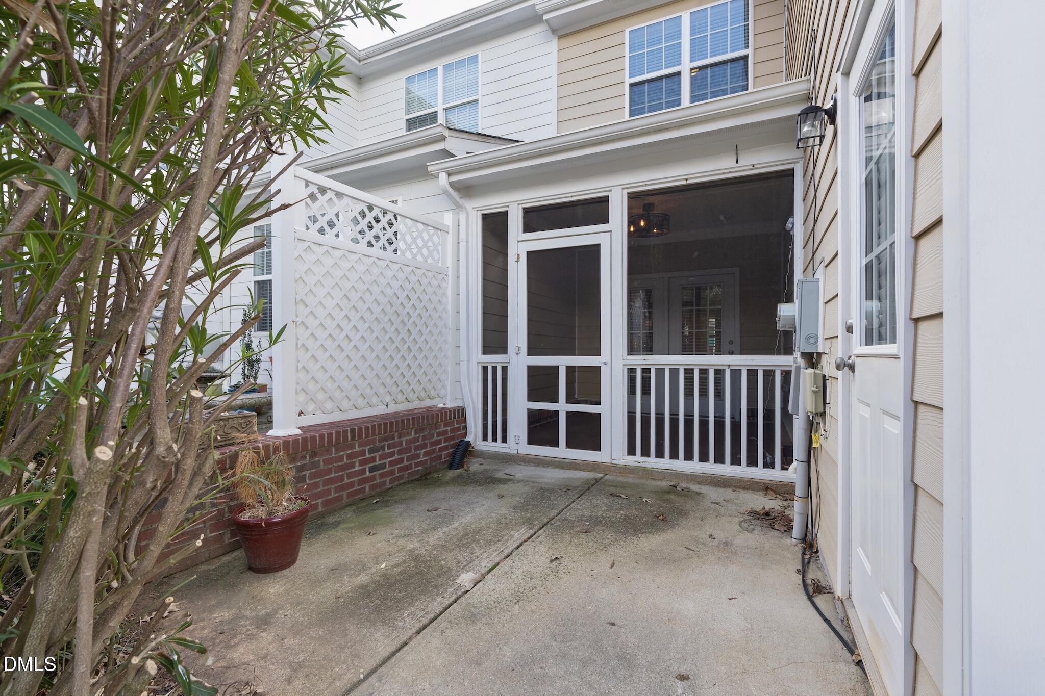 616 Democracy Street Raleigh, NC 27603 - Photo 59 of 61 a view of a porch with a bench