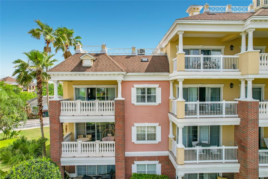 1116 Sunset View Circle, Unit 304 Reunion, FL 34747 - Photo 34 of 37 front view of a building