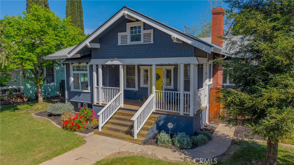 303 West 21st Street Merced, CA 95340 - Photo 11 of 52 a front view of a house with garden