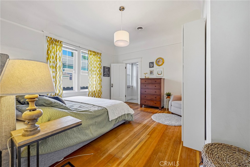 303 West 21st Street Merced, CA 95340 - Photo 29 of 52 a spacious bedroom with a bed and dresser