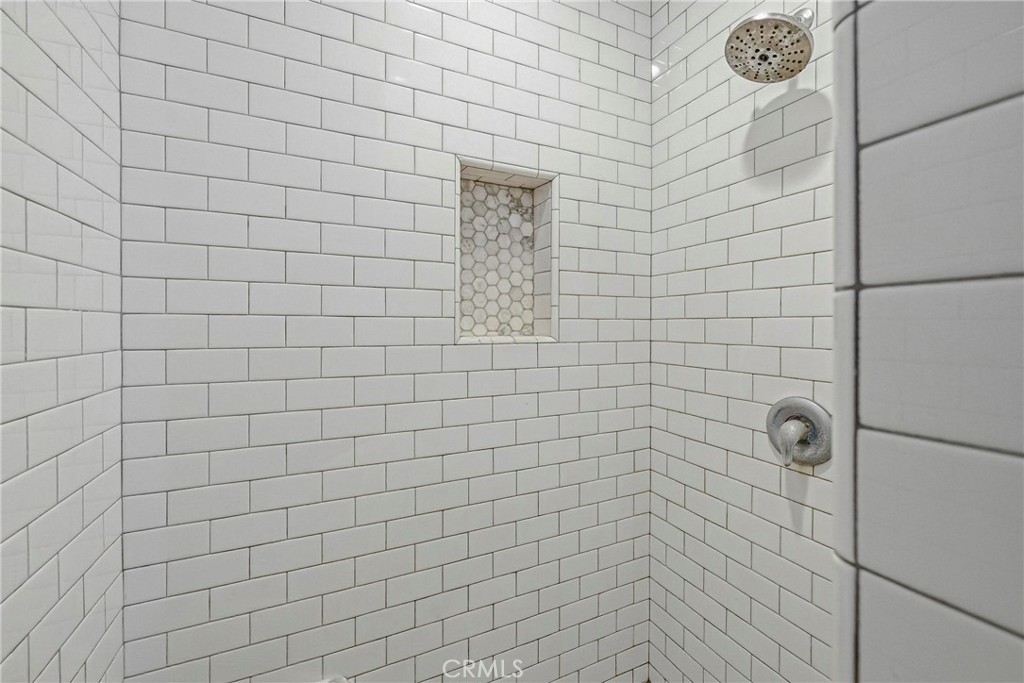 303 West 21st Street Merced, CA 95340 - Photo 32 of 52 a bathroom with a shower