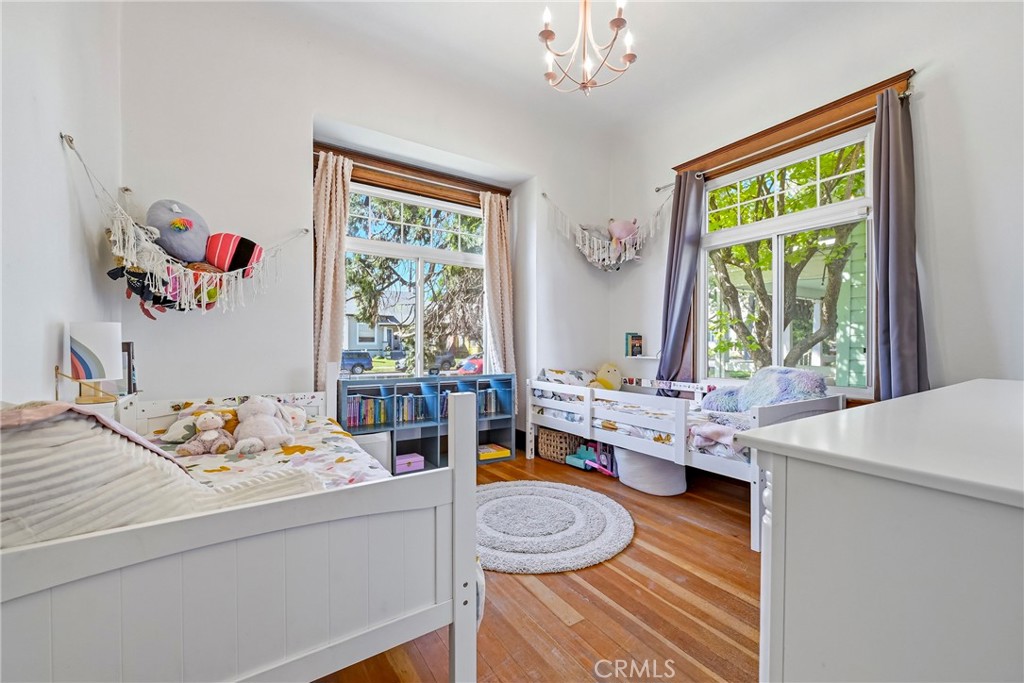 303 West 21st Street Merced, CA 95340 - Photo 34 of 52 a bed room with furniture and a window