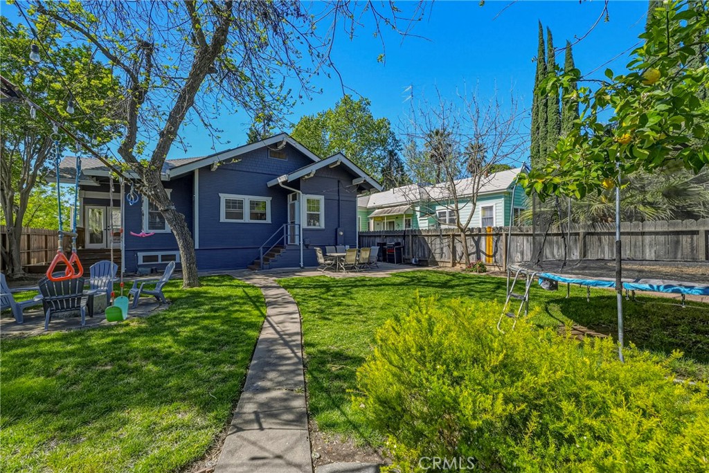 303 West 21st Street Merced, CA 95340 - Photo 51 of 52 a view of a house with a swimming pool