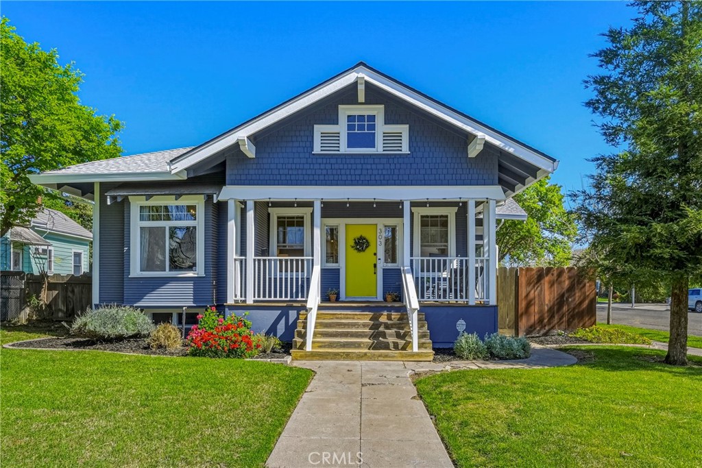 303 West 21st Street Merced, CA 95340 - Photo 6 of 52 a front view of a house with garden