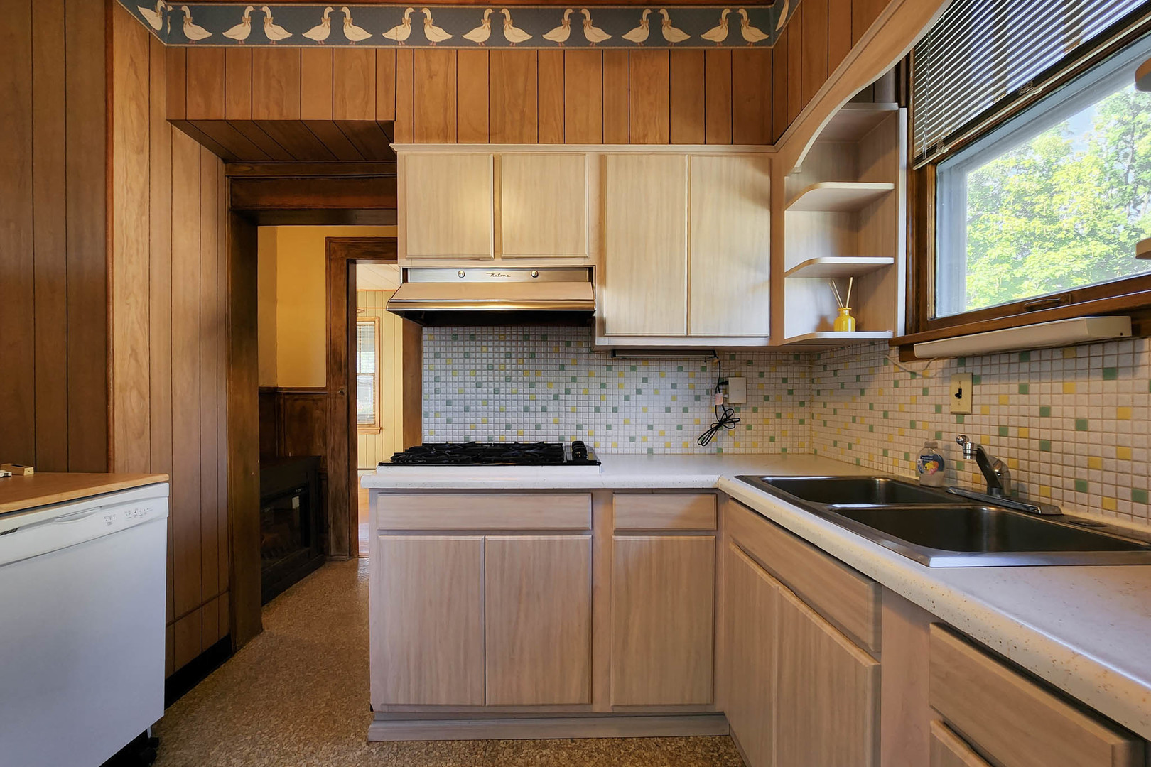 506 South Denver Street Bloomington, IL 61701 - Photo 12 of 41 a kitchen with stainless steel appliances granite countertop a sink a refrigerator and a stove
