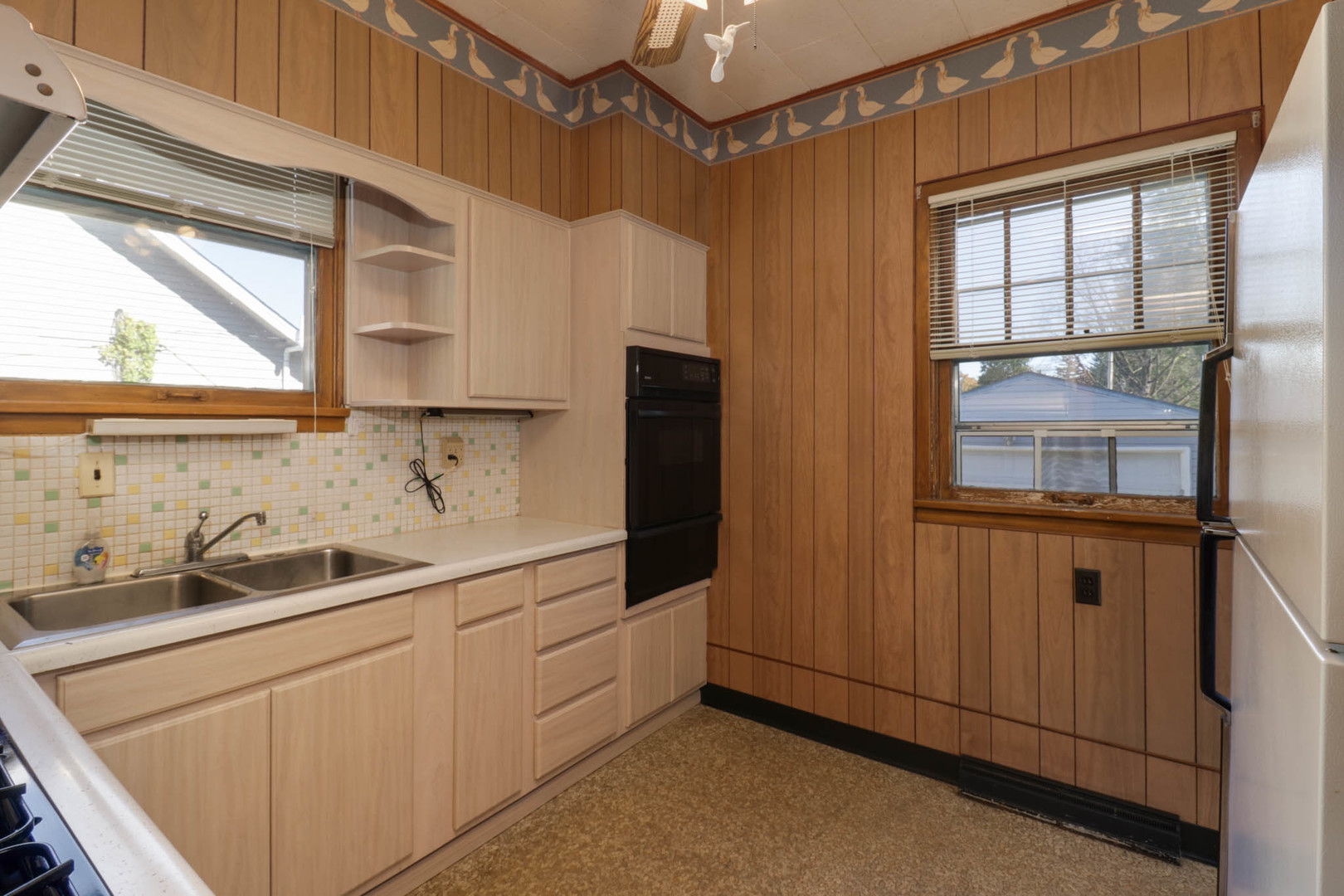 506 South Denver Street Bloomington, IL 61701 - Photo 13 of 41 a kitchen with a sink and cabinets