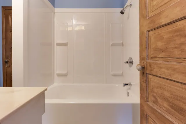 a bathroom with a bathtub