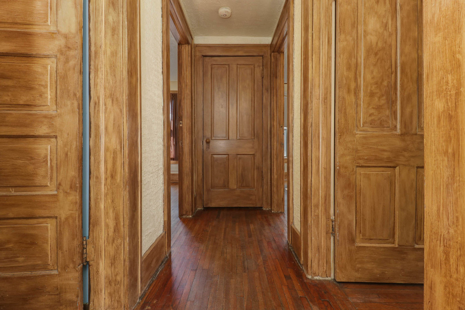 506 South Denver Street Bloomington, IL 61701 - Photo 24 of 41 a view of a hallway with wooden floor