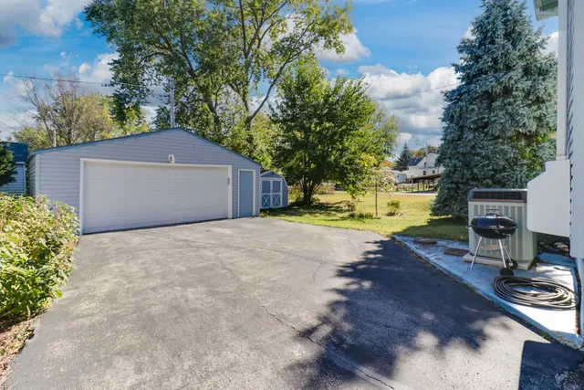 a view of a room with wooden walls