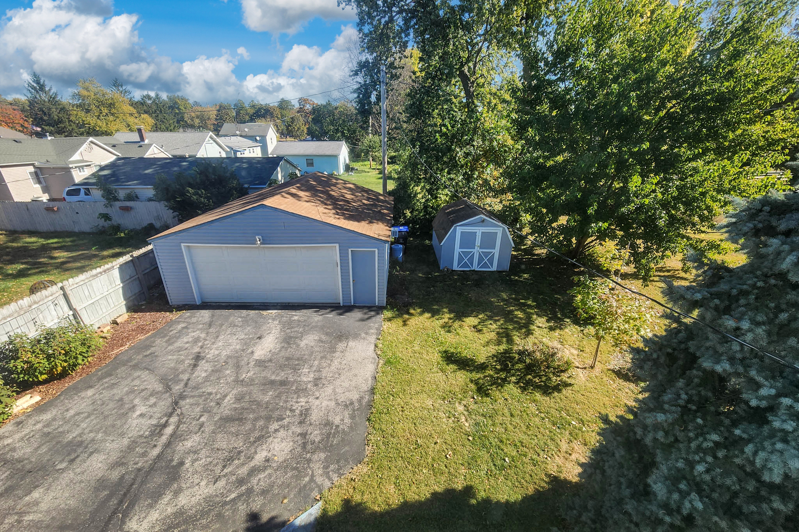 506 South Denver Street Bloomington, IL 61701 - Photo 34 of 41 a front view of a house with a yard