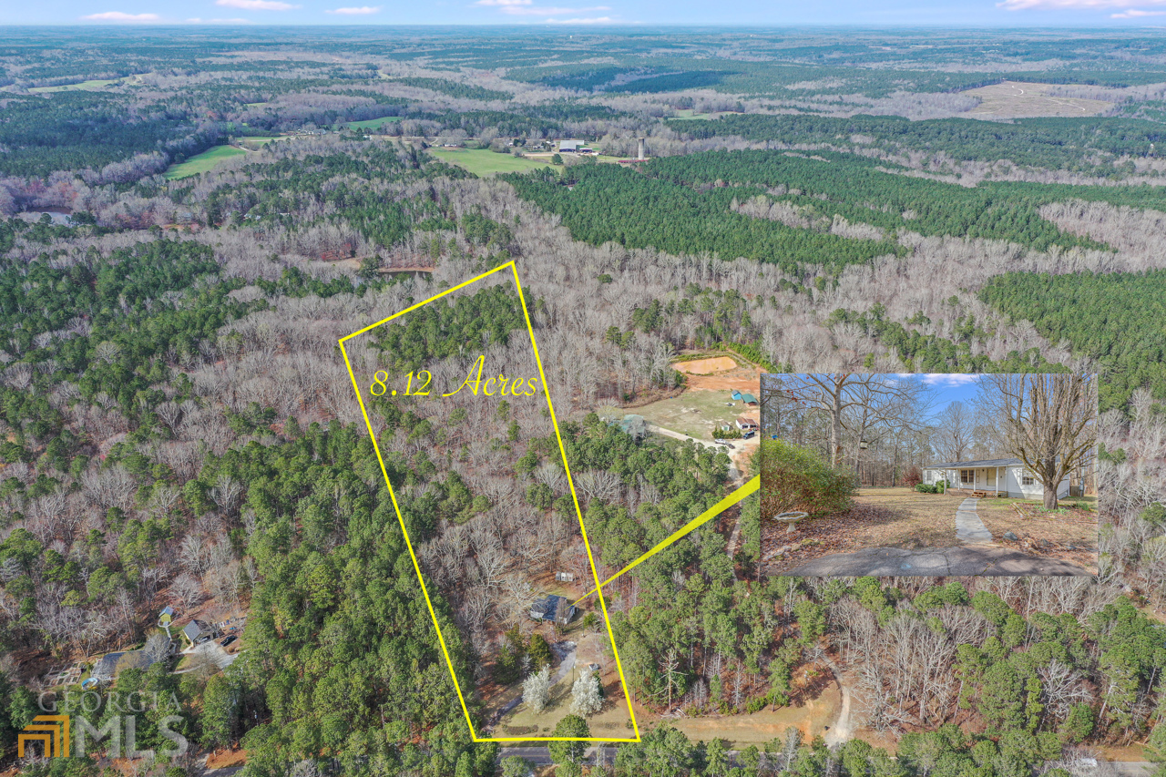 295 Wesley Chapel Road Lexington, GA 30648 - Photo 1 of 1 an aerial view of residential house with outdoor space