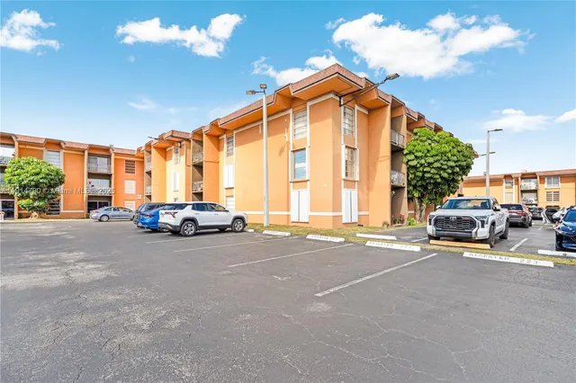 a view of a street with cars