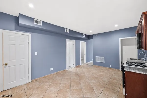 a view of livingroom with kitchen