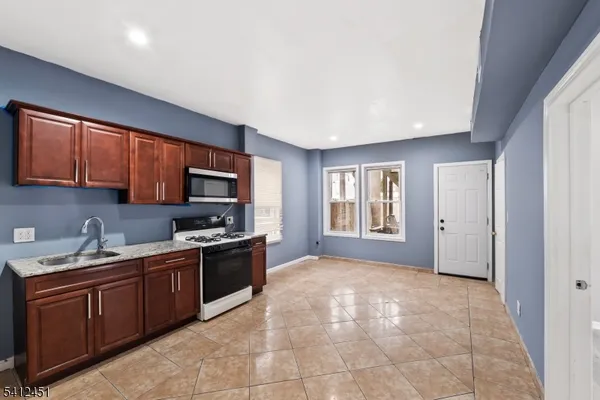 a view of livingroom with kitchen