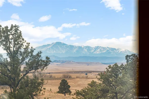 a view of lake with mountain