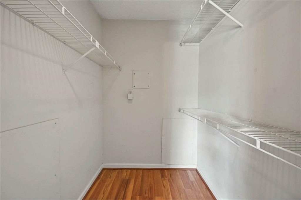 4106 Chastain Park Court Northeast Atlanta, GA 30342 - Photo 22 of 33 a view of a room with wooden floor