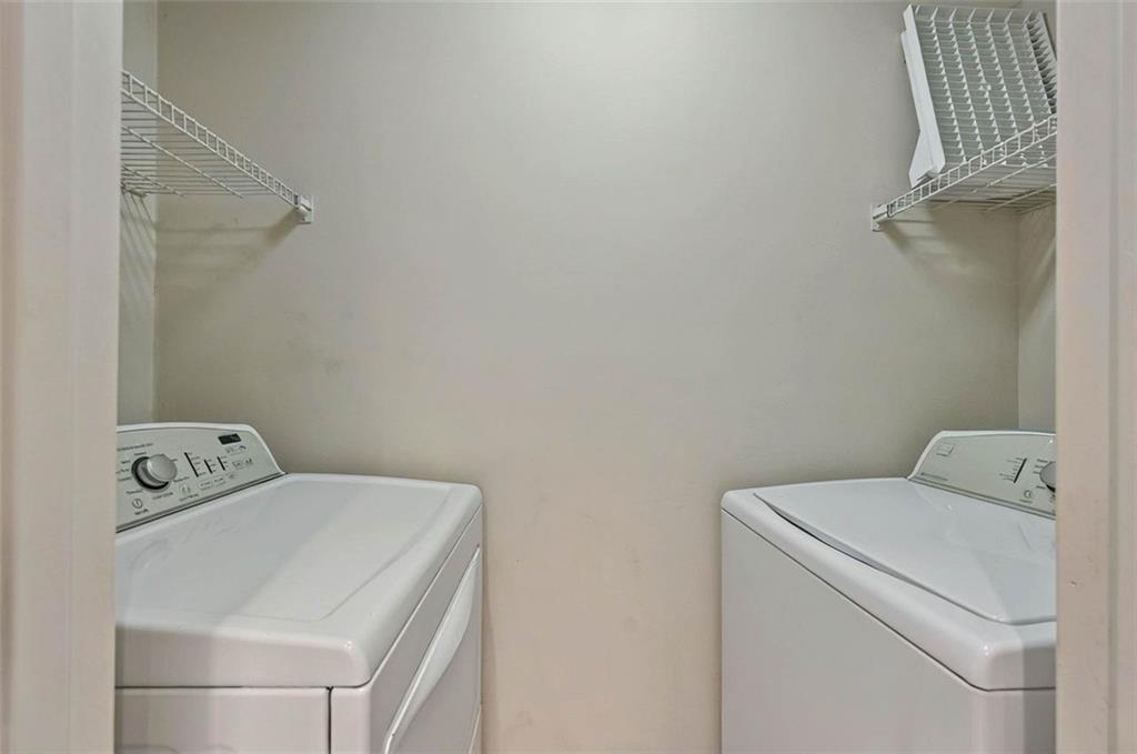 4106 Chastain Park Court Northeast Atlanta, GA 30342 - Photo 26 of 33 a utility room with dryer and washer
