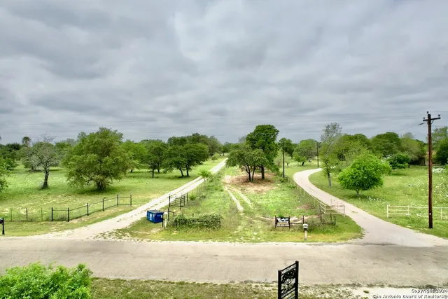 a view of a garden and basketball court