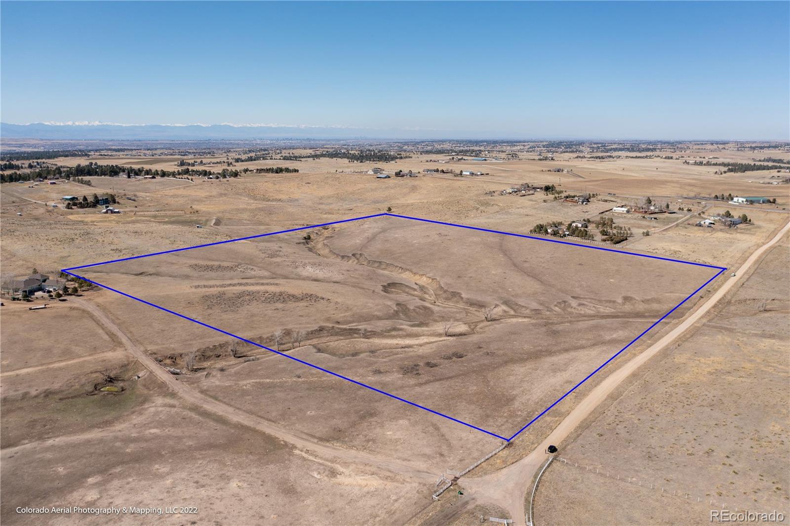 Delbert Road Parker, CO 80138 - Photo 5 of 9 an ocean view with beach