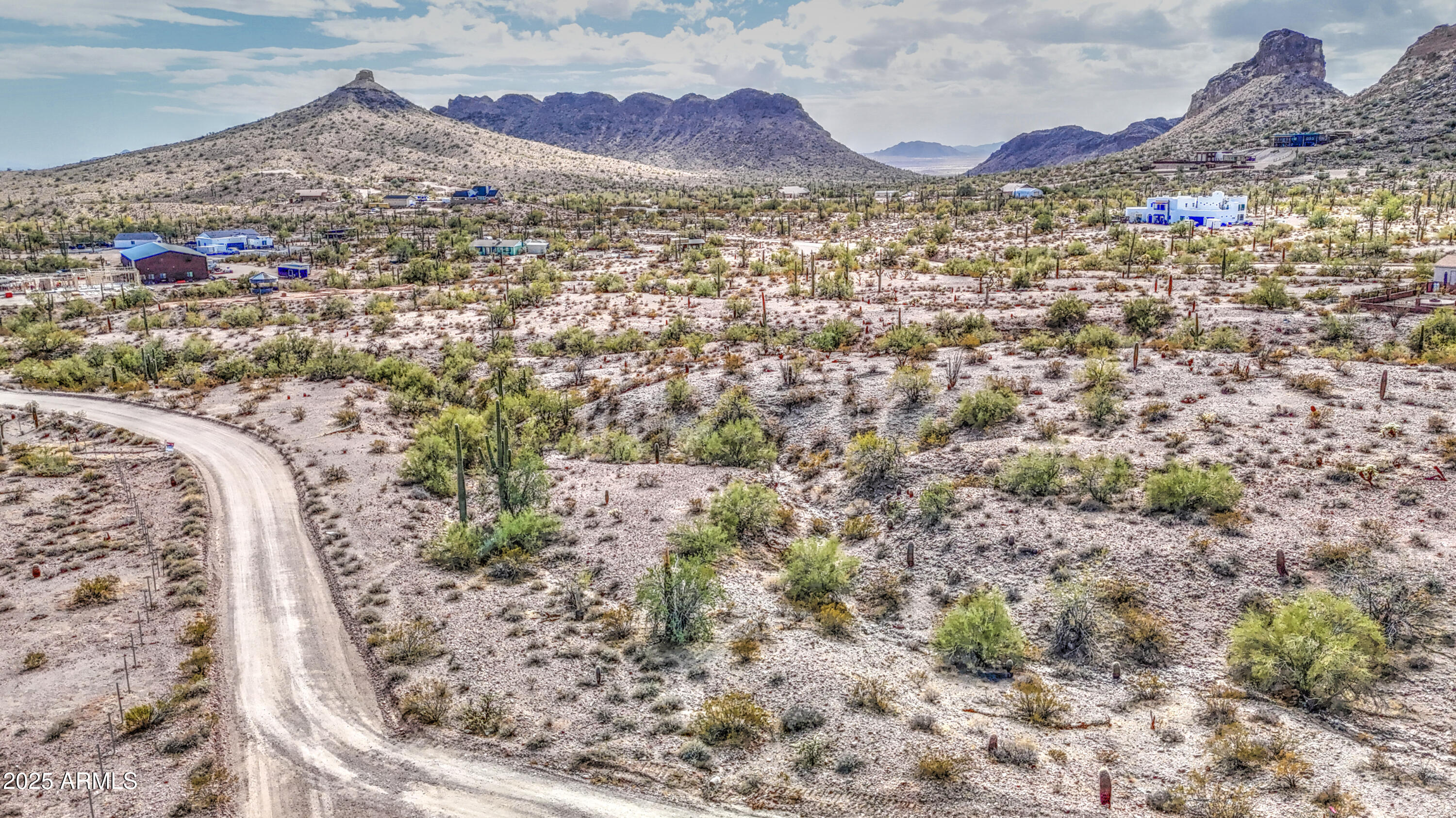 0 North Ellen Road, Unit 7 Queen Creek, AZ 85144 - Photo 16 of 27 a view of a house with a yard and mountain