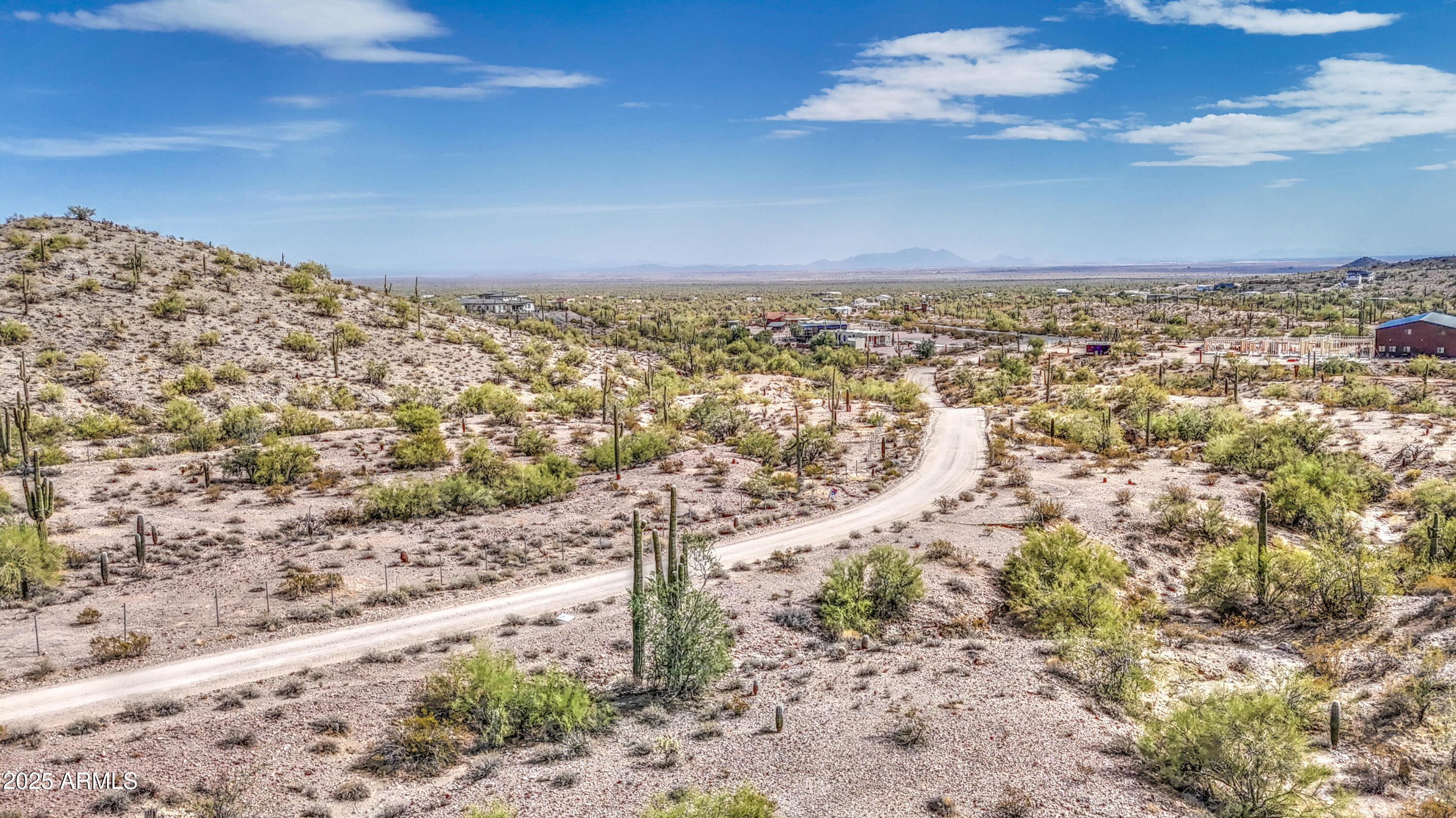 0 North Ellen Road, Unit 7 Queen Creek, AZ 85144 - Photo 25 of 27 a view of a dry yard with wooden fence