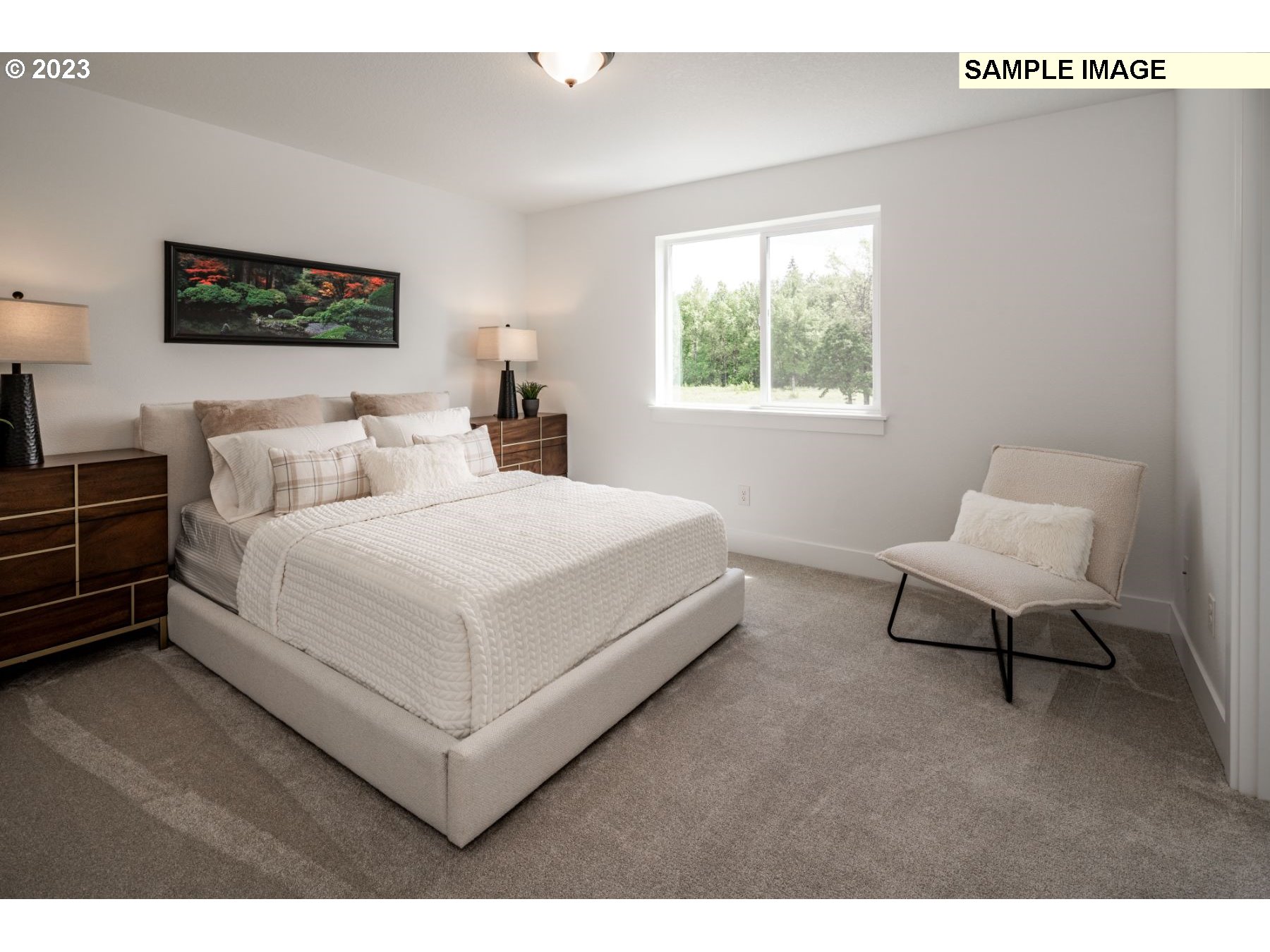 1020 Northwest 178th Street Ridgefield, WA 98642 - Photo 11 of 19 a bedroom with a bed and a chair