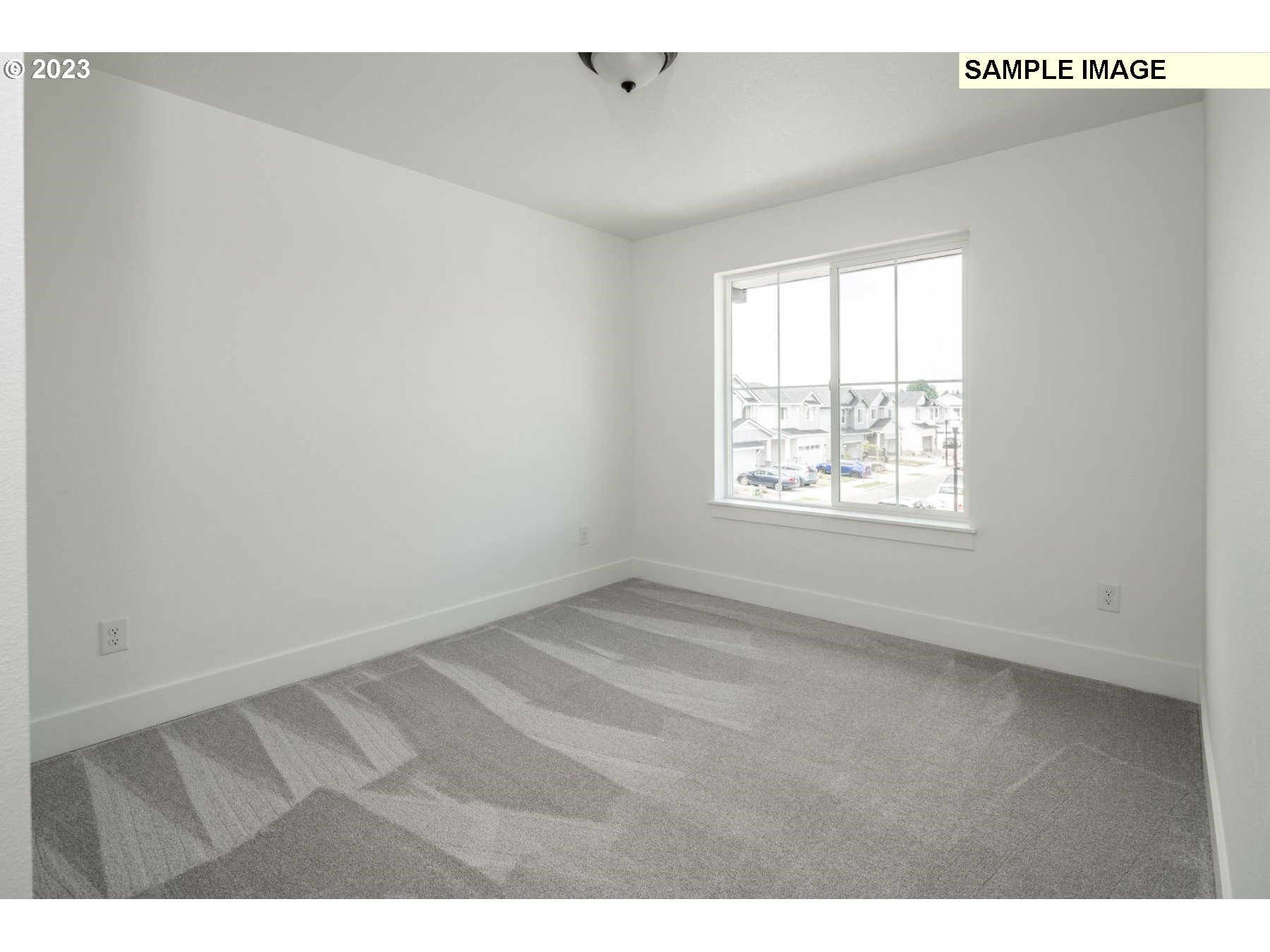 1020 Northwest 178th Street Ridgefield, WA 98642 - Photo 18 of 19 a view of an empty room with a window