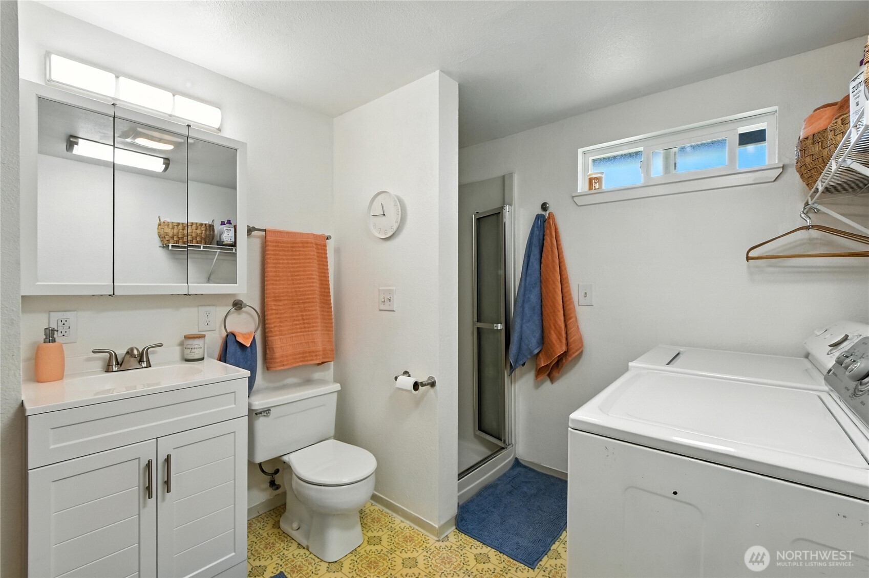 2102 35th Avenue Longview, WA 98632 - Photo 23 of 31 a bathroom with a sink toilet and shower