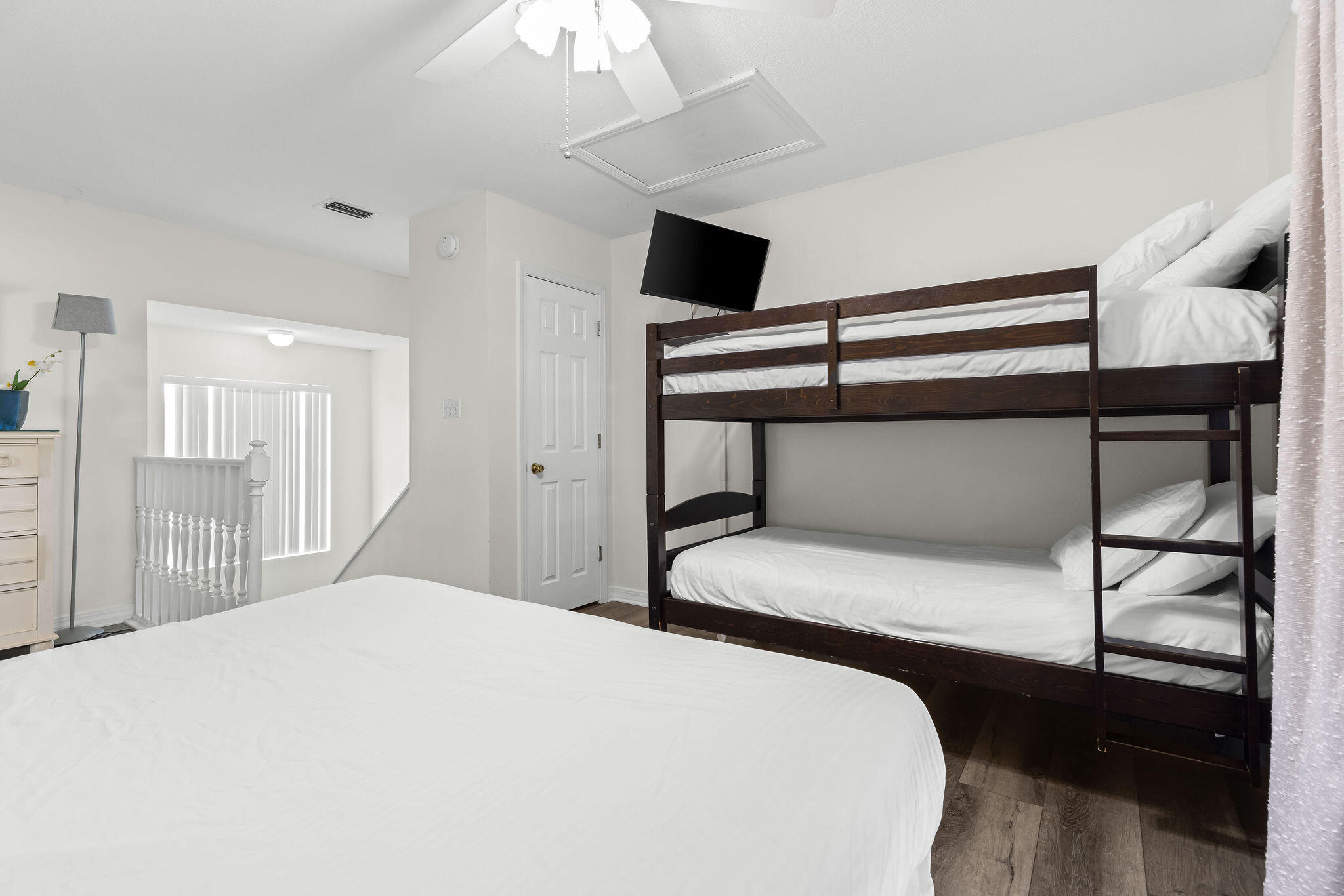 91 Matthew Boulevard Destin, FL 32541 - Photo 74 of 85 a bedroom with a bed and a night stand