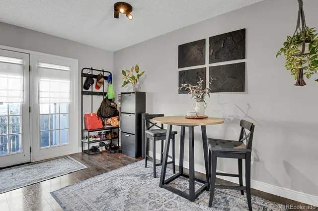 a work room with furniture and a window