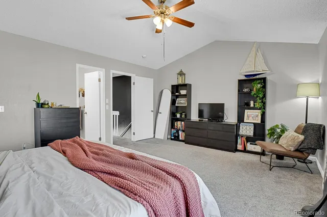 a bedroom with a bed and furniture