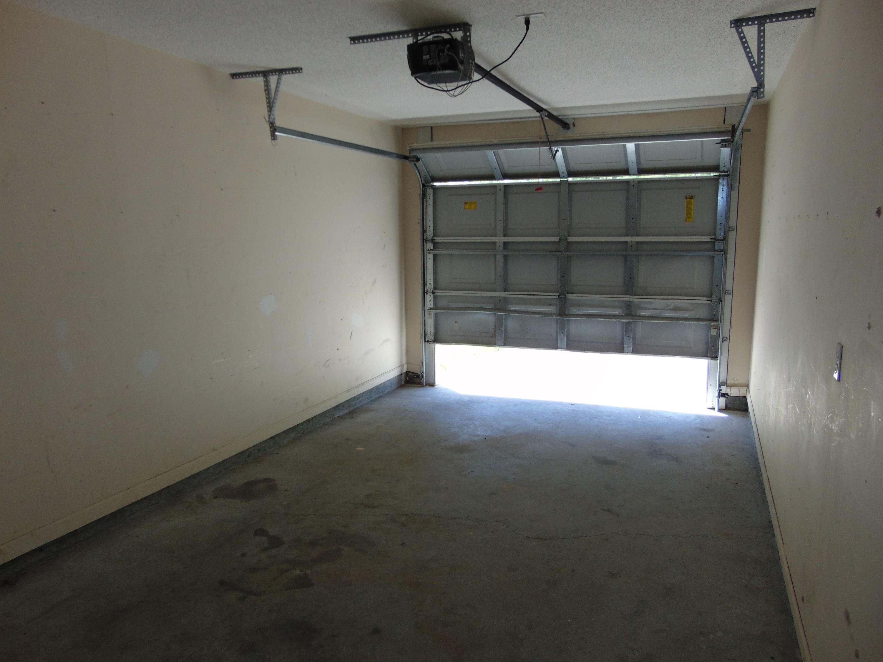 116 Spurrier Way, Unit B Moncks Corner, SC 29461 - Photo 20 of 27 GARAGE DOOR OPENER