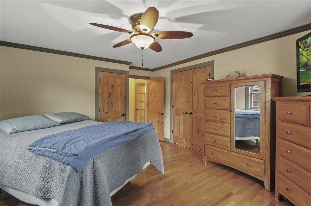 8 Beach Road Shrewsbury, MA 01545 - Photo 11 of 40 a bedroom with a bed and a dresser