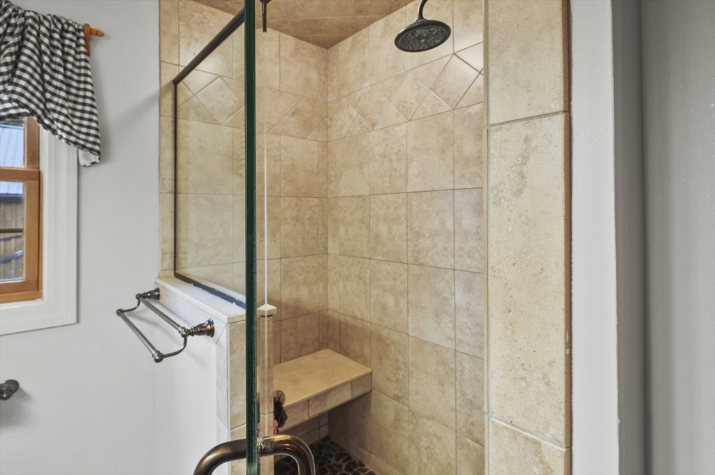 8 Beach Road Shrewsbury, MA 01545 - Photo 13 of 40 a bathroom with a shower