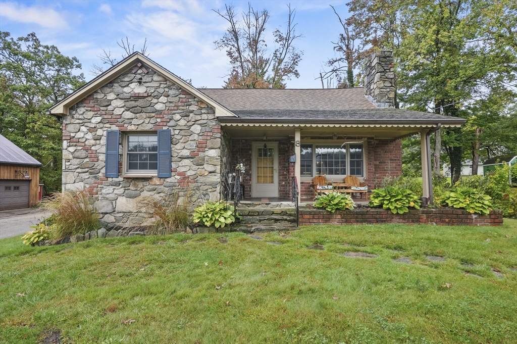 8 Beach Road Shrewsbury, MA 01545 - Photo 2 of 40 a front view of a house with garden