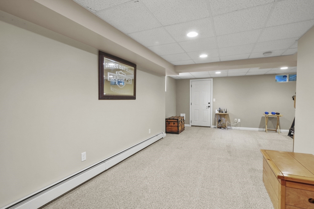 8 Beach Road Shrewsbury, MA 01545 - Photo 23 of 40 a view of a livingroom with furniture and a ceiling fan