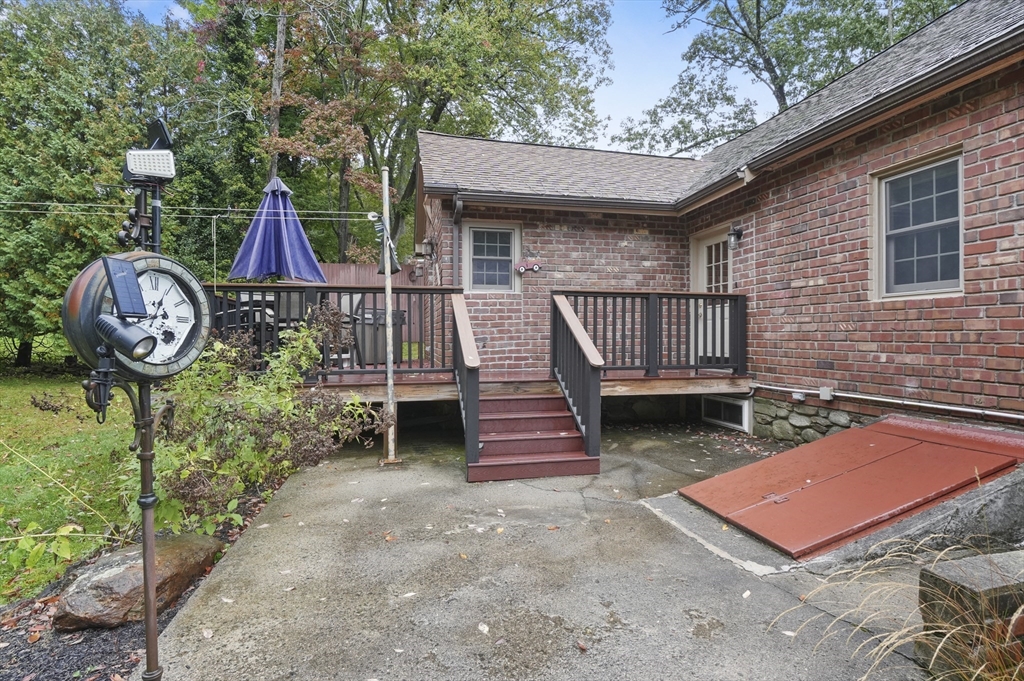 8 Beach Road Shrewsbury, MA 01545 - Photo 29 of 40 a front view of a house with garden