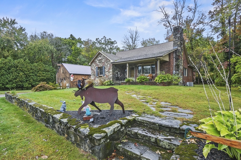 8 Beach Road Shrewsbury, MA 01545 - Photo 40 of 40 a view of a house with a yard porch and sitting area