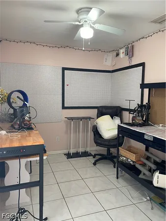 a bedroom with a bed and a mirror