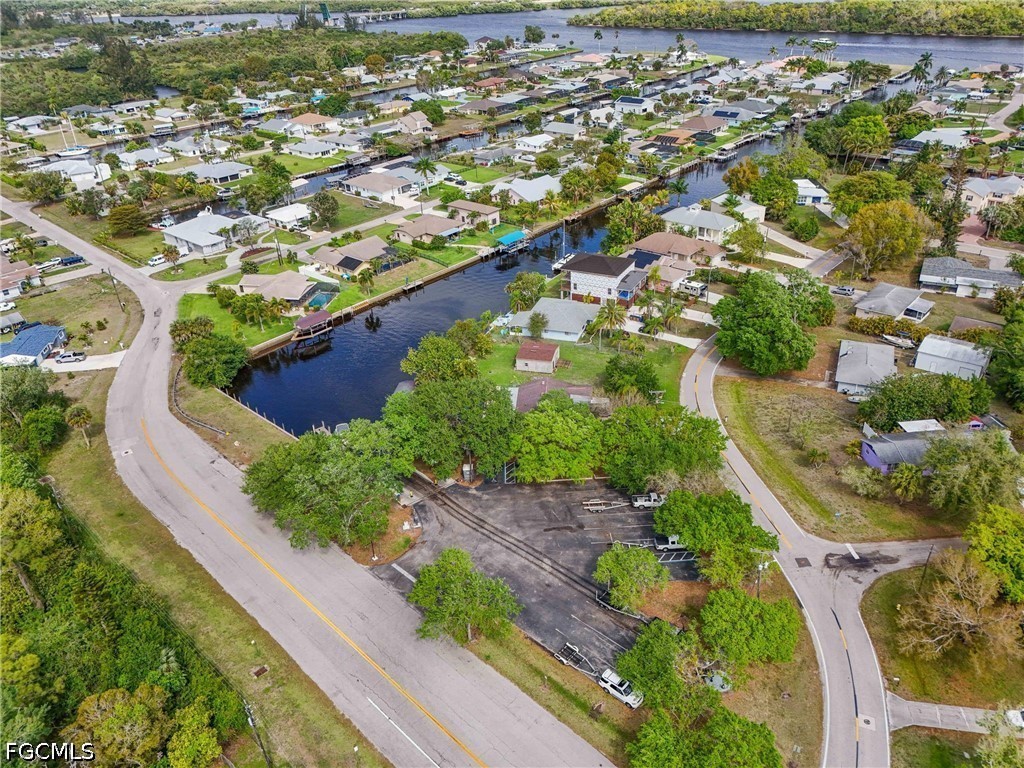 2239 Lotus Road Fort Myers, FL 33905 - Photo 21 of 26 an aerial view of residential houses with outdoor space