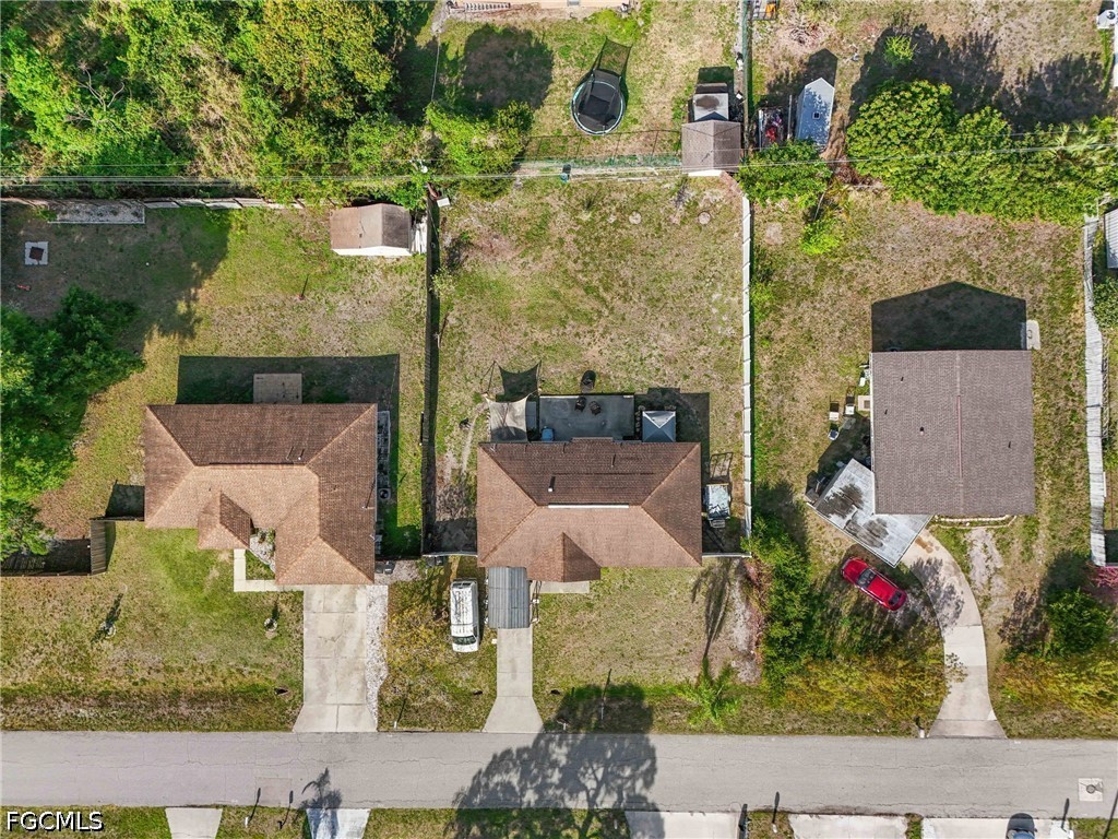 2239 Lotus Road Fort Myers, FL 33905 - Photo 22 of 26 an aerial view of houses with yard