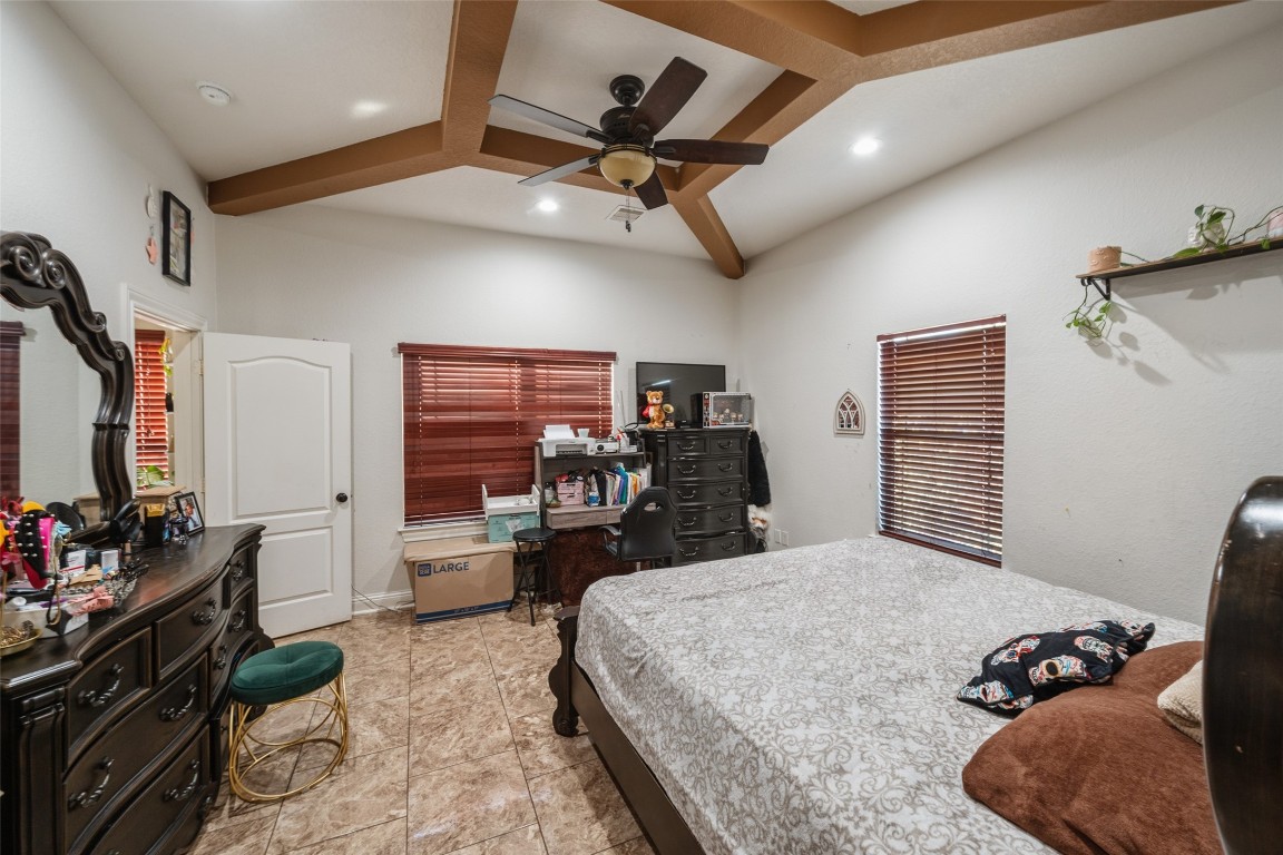 1508 Miami Road Pasadena, TX 77502 - Photo 18 of 34 a bed room with a bed and furniture