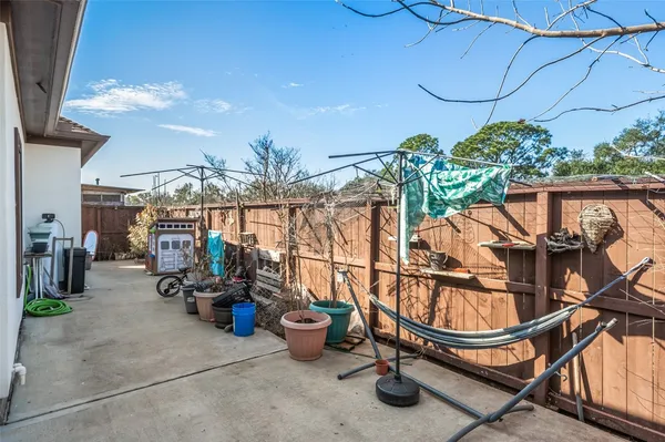 a view of a chairs and tables in the patio