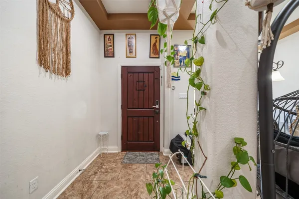 a view of entryway with wooden floor