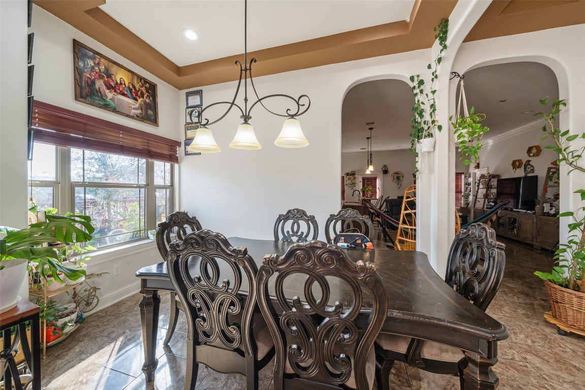 1508 Miami Road Pasadena, TX 77502 - Photo 7 of 34 a view of a dining room with furniture window and wooden floor