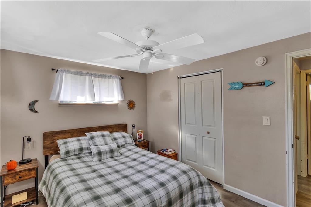 3779 Northern Pike Monroeville, PA 15146 - Photo 22 of 31 a bedroom with a bed and a ceiling fan