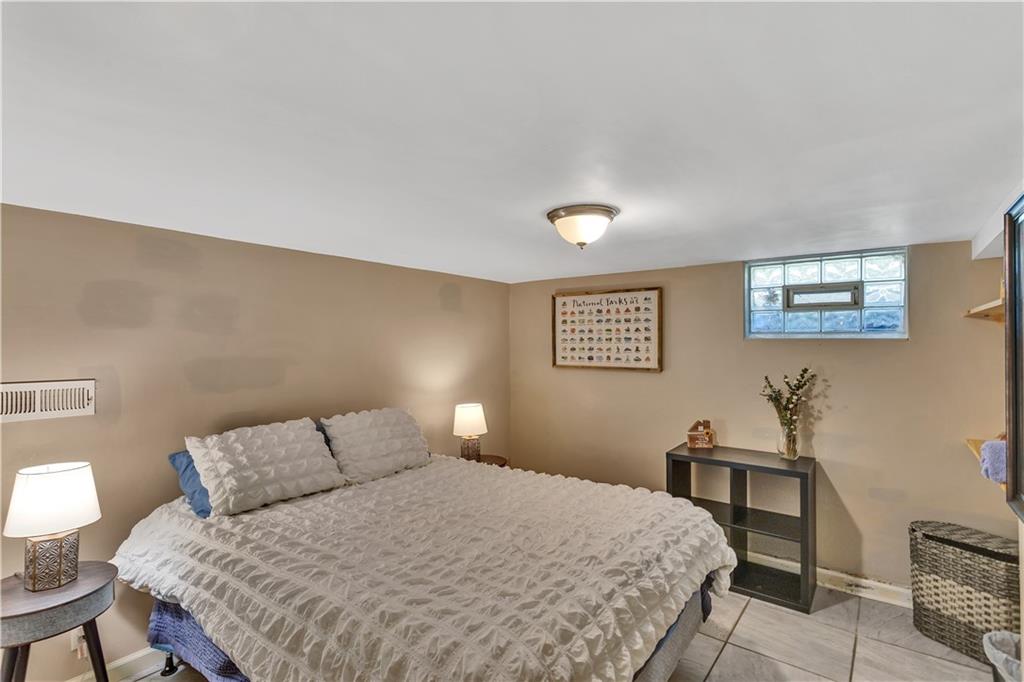 3779 Northern Pike Monroeville, PA 15146 - Photo 26 of 31 a bedroom with a bed and a table in it