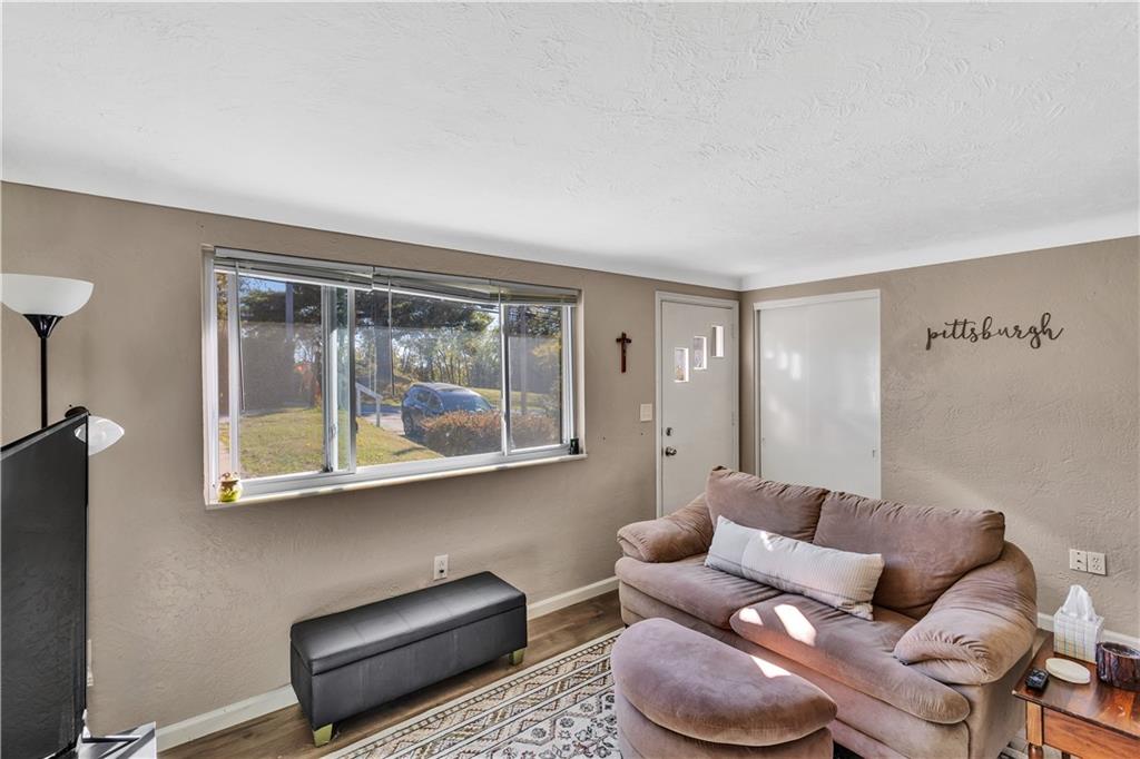 3779 Northern Pike Monroeville, PA 15146 - Photo 6 of 31 a living room with furniture and a window
