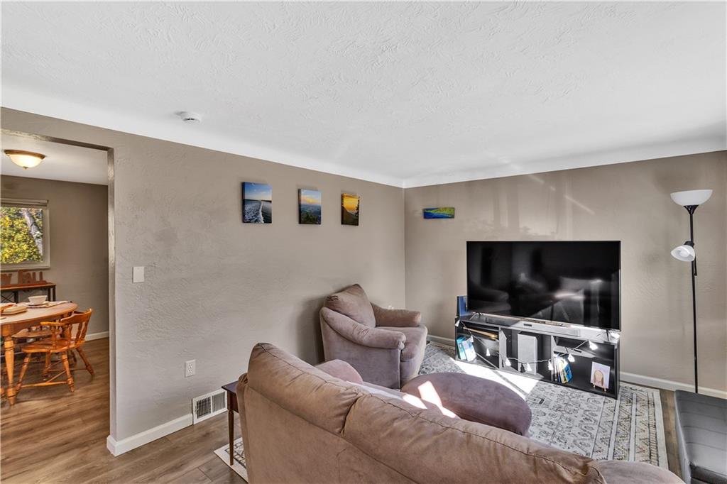 3779 Northern Pike Monroeville, PA 15146 - Photo 7 of 31 a living room with furniture and a flat screen tv