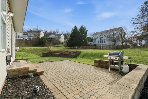 a view of a garden with patio
